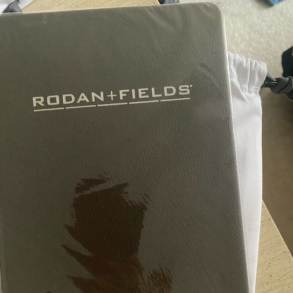 Rodan & Fields notebook with bag